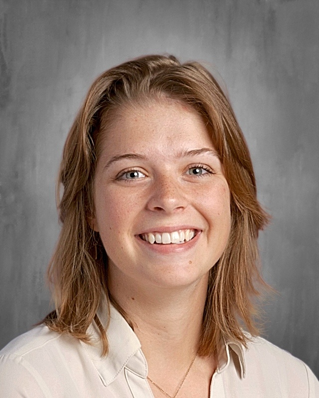 woman with short light brown hair
