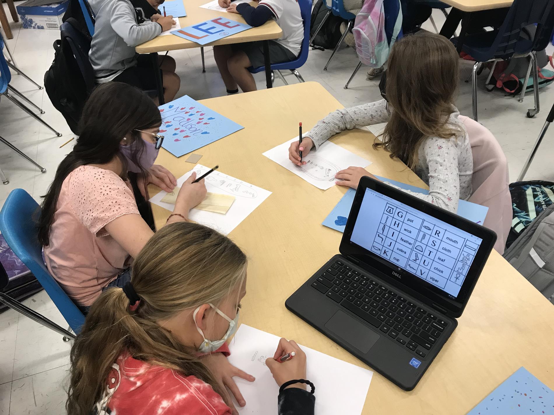 Middle School Students in Class doing Activities