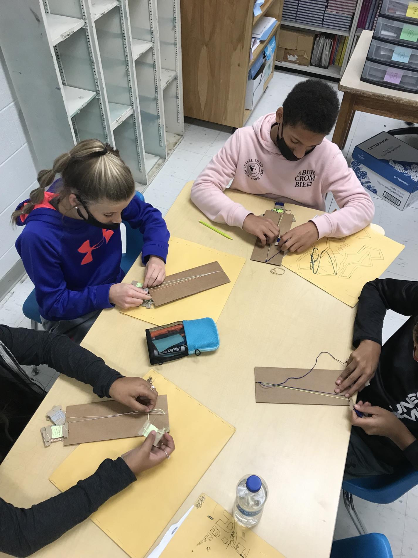 Middle School Students in Class doing Activities