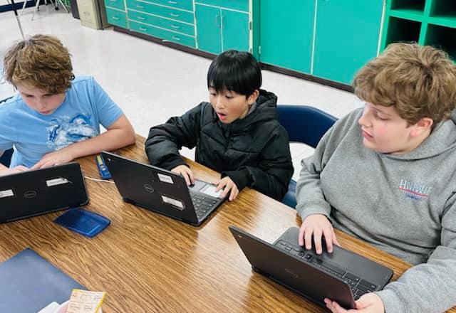 AIG student working on a project