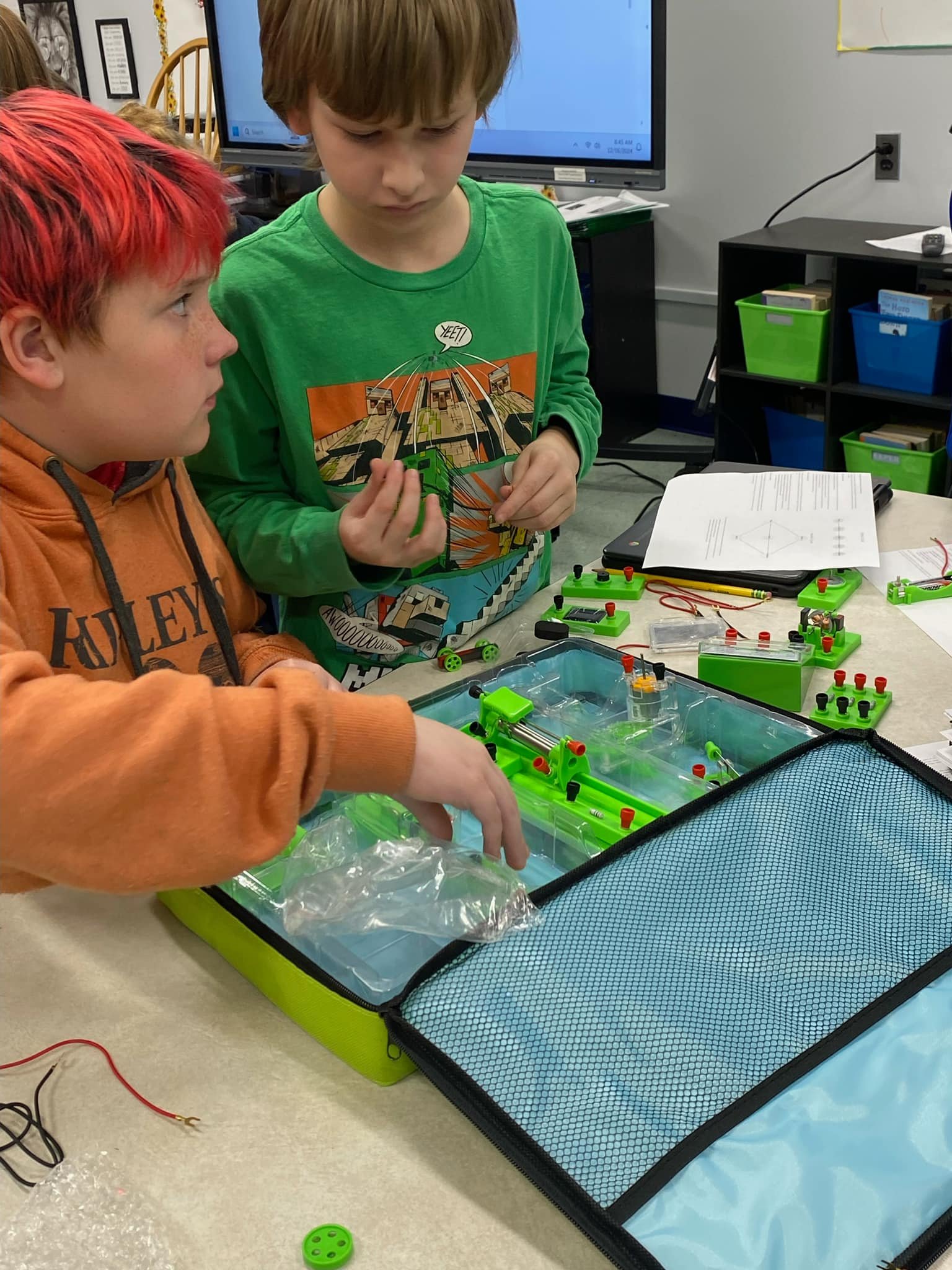 AIG students working on a project
