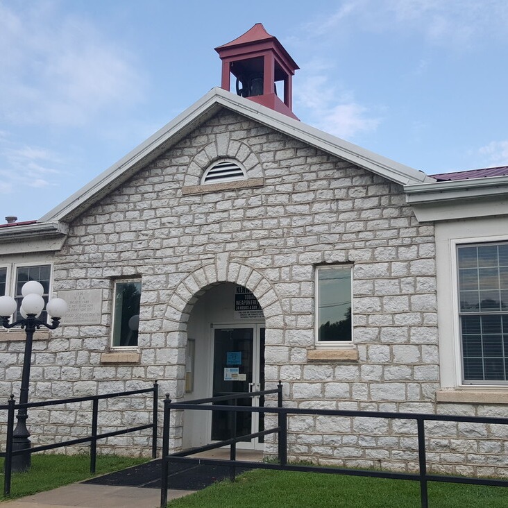 Kenwood school building with blue sky background