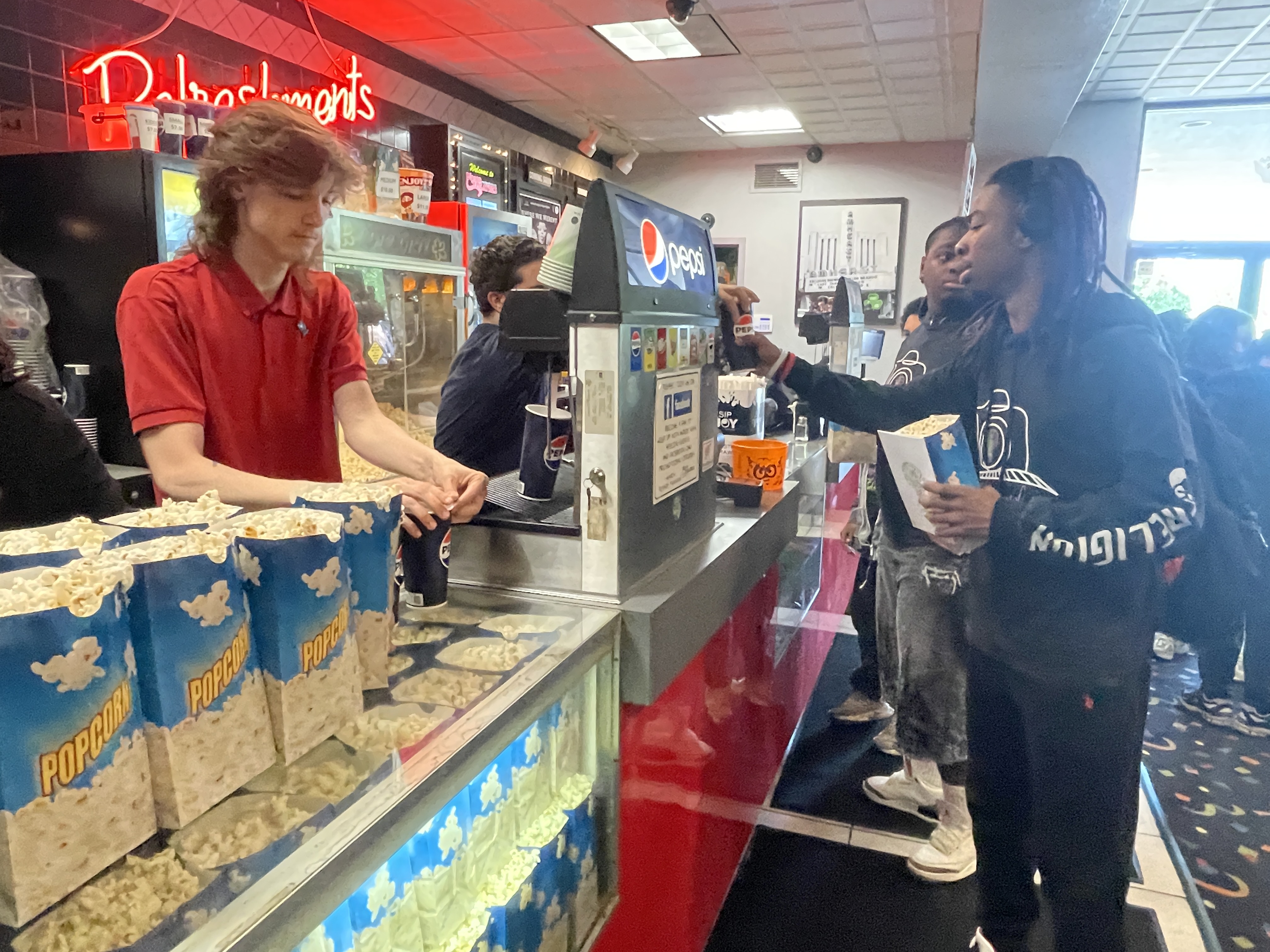 Students at getting popcorn