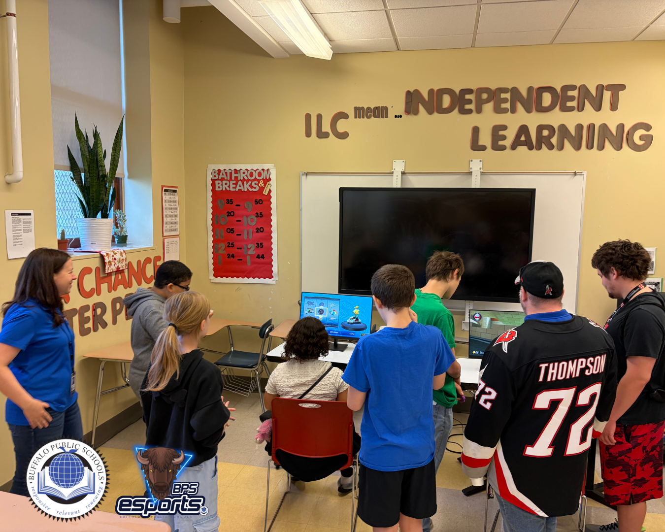Students Playing Video Games on Desktop Computer