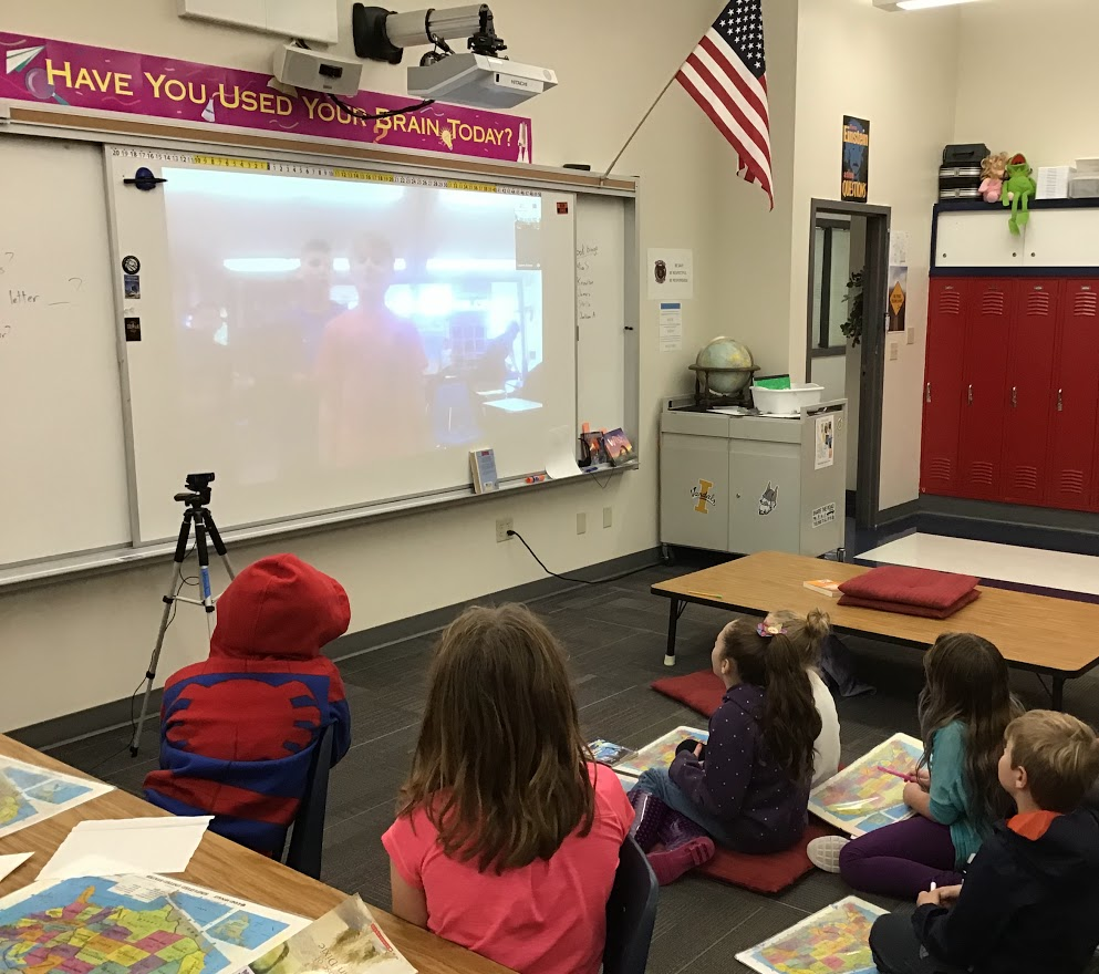 students in the classroom watching the projector