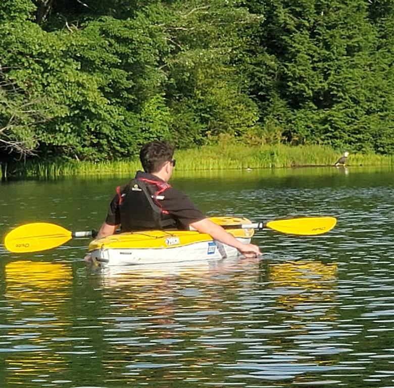 Mr. Koschak in a kayak
