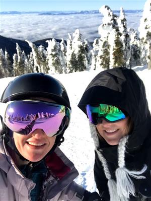teacher taking a selfie using snowboarding equipment