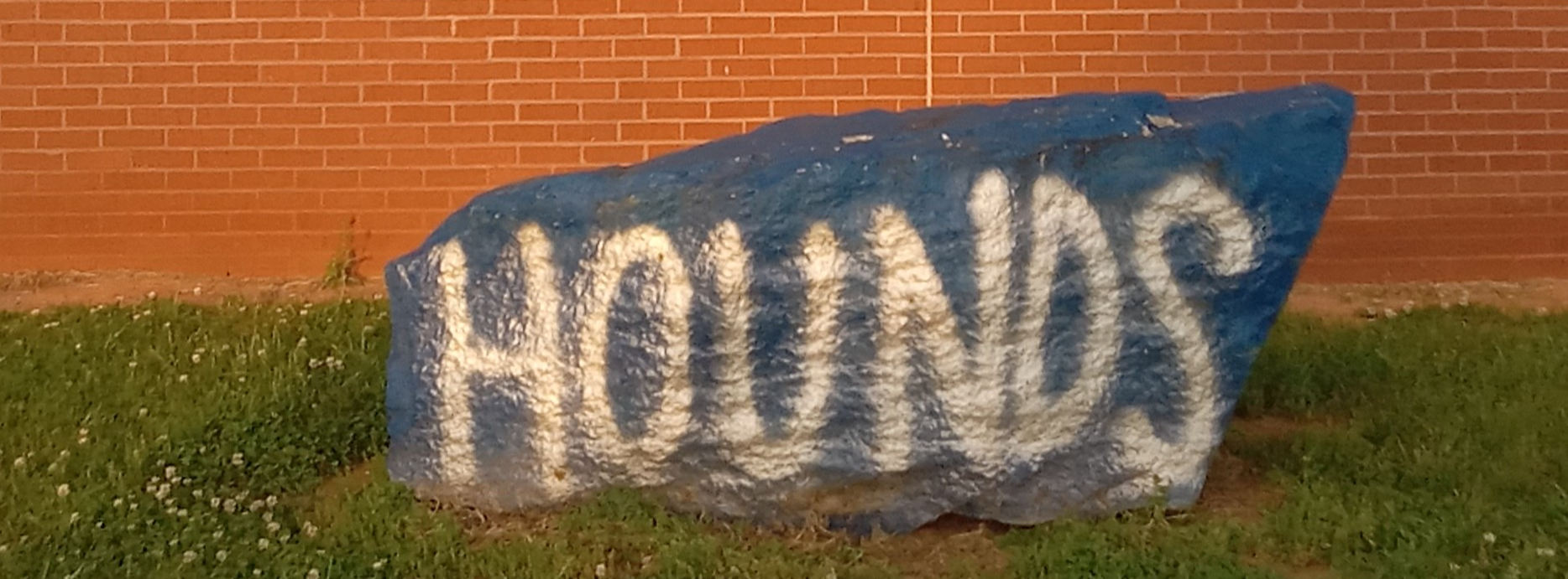 Rock with Hounds written on it.