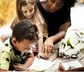Teacher helping students with activities
