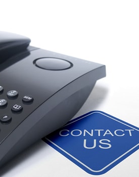 Contact Us sticker with a landline phone on top