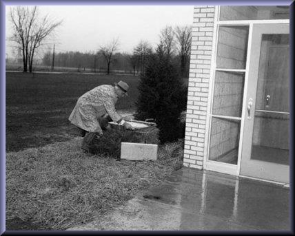 Mr. Raymond G. Bates Laying the cornerstone of Bates School ~ 1957