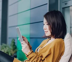 woman using her tablet