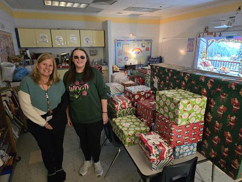 Staff with presents collected for Christmas Angel Tree