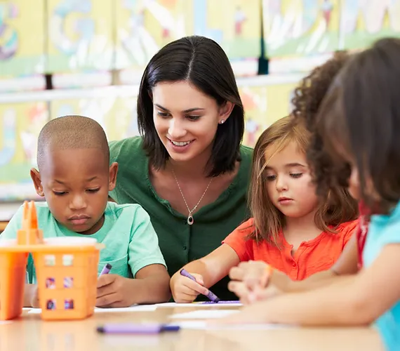 Preschool teacher and students