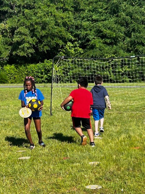 Students participate in a relay race game