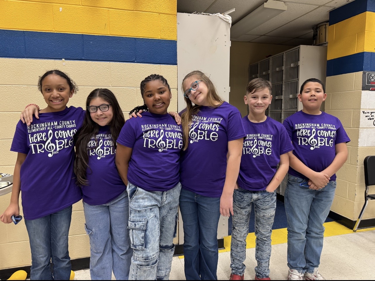 A group of students representing the school All County Chorus team.