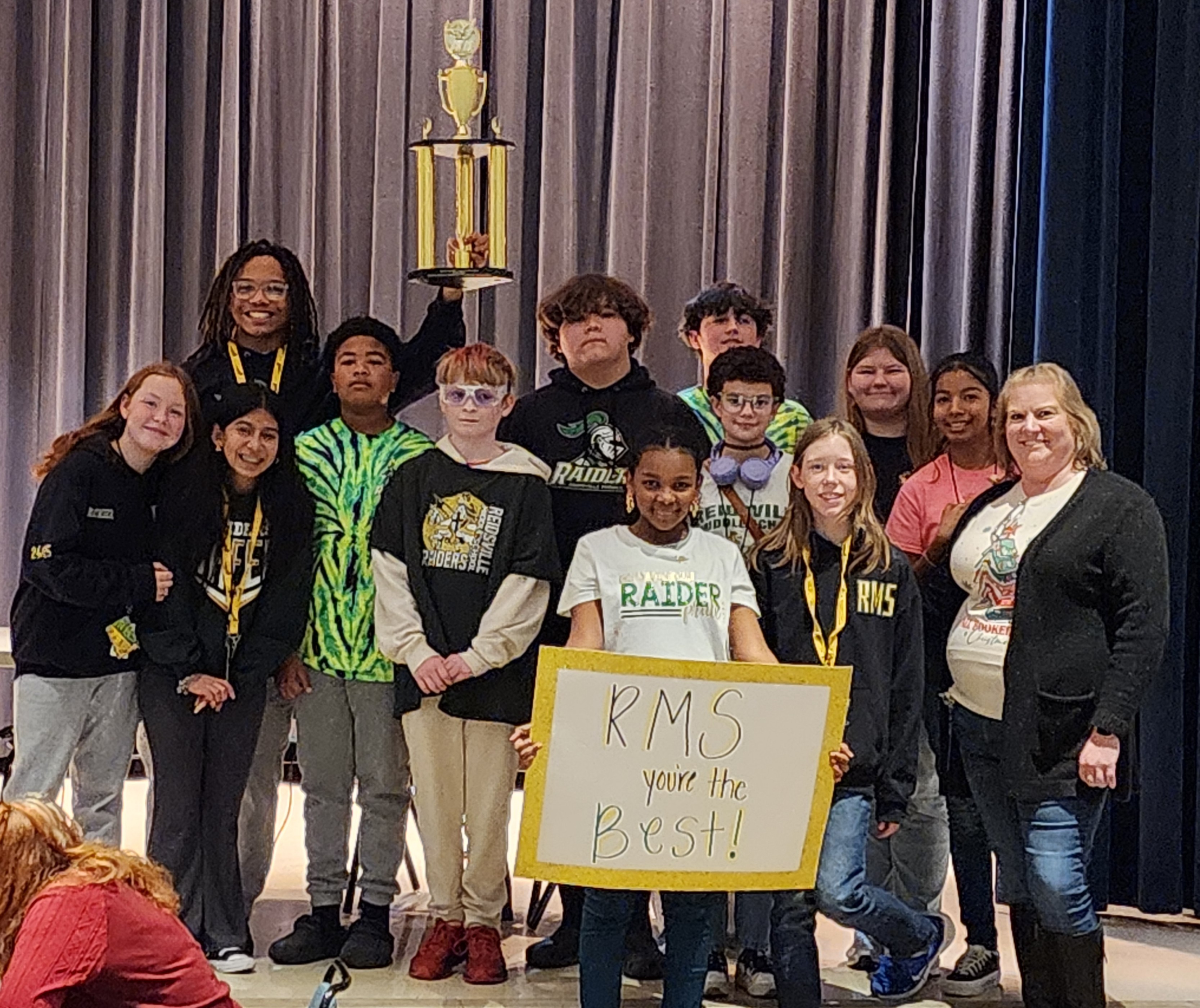 RMS Middle School Academic Challenge Team holding trophy from winning the competition in 2025