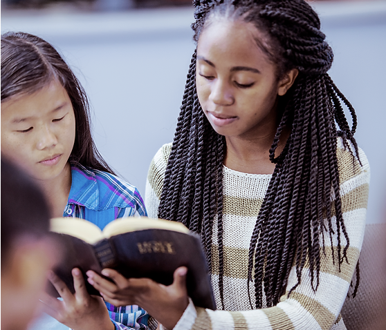 girls reading the bible