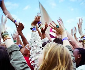 bunch of teenagers enjoying a festival