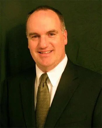 an image of a man wearing a brown necktie