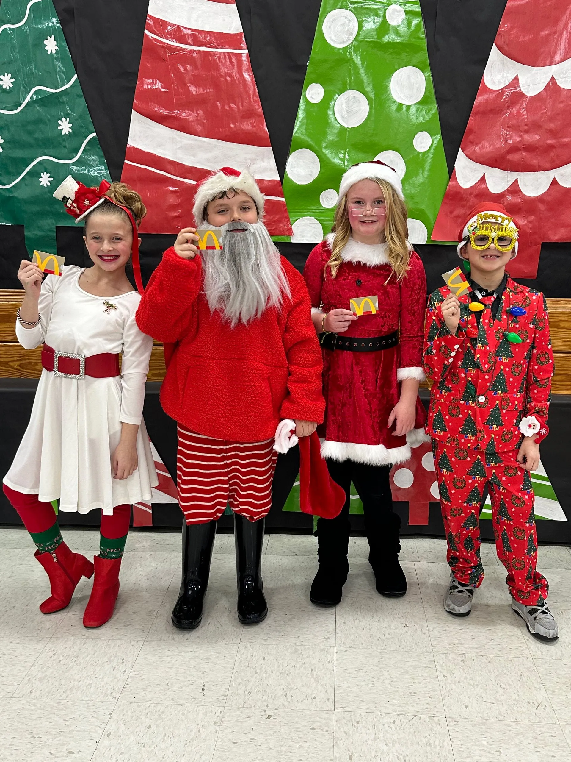 children wearing their christmas costume