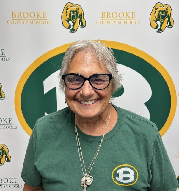 an image of a woman wearing a green shirt