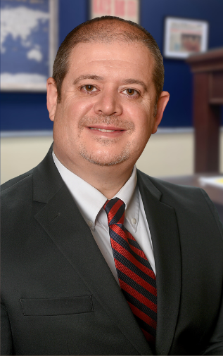 Smiling man in tie and suit 