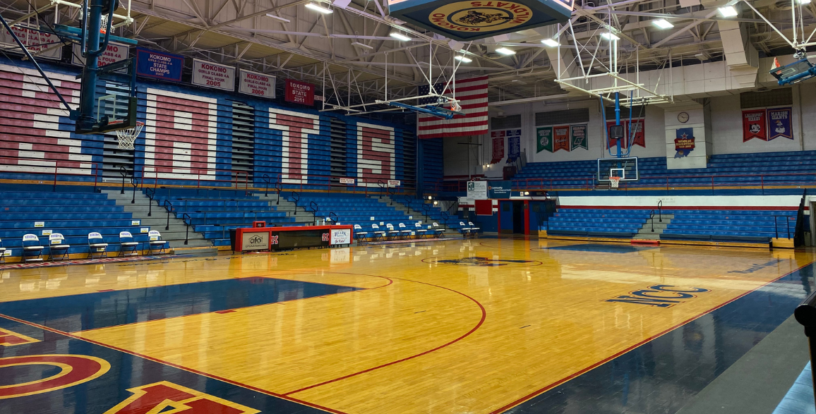 Basketball gymnasium blue bleachers