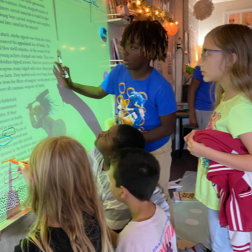 students working together using technology