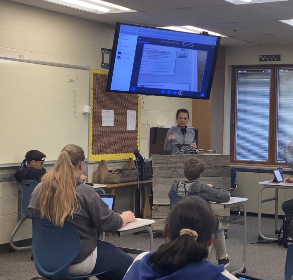 Teacher and students in class