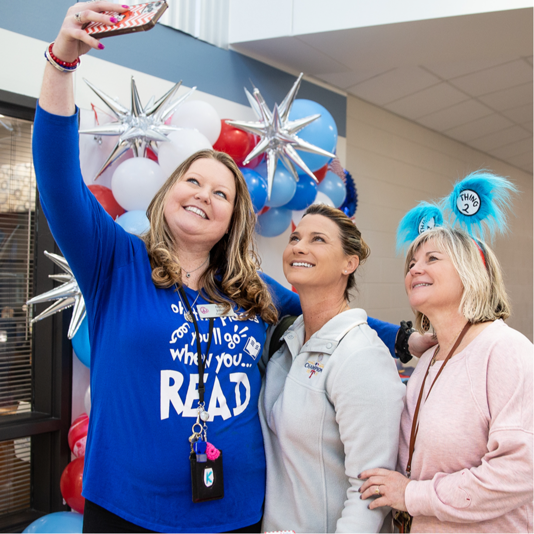 Teachers taking a selfie at a Read Across American event