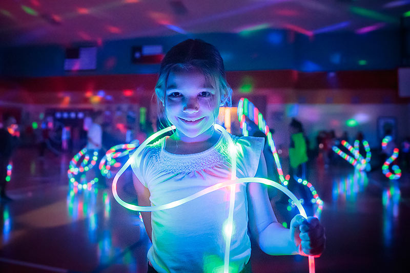 Girl with neon jumping rope