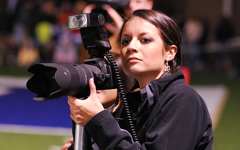 student photographer  holding a camera