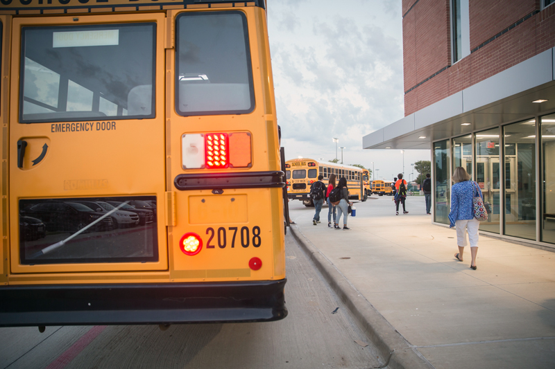 students exiting the school bus