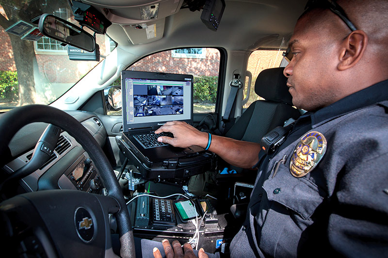 officer in his police vehicle