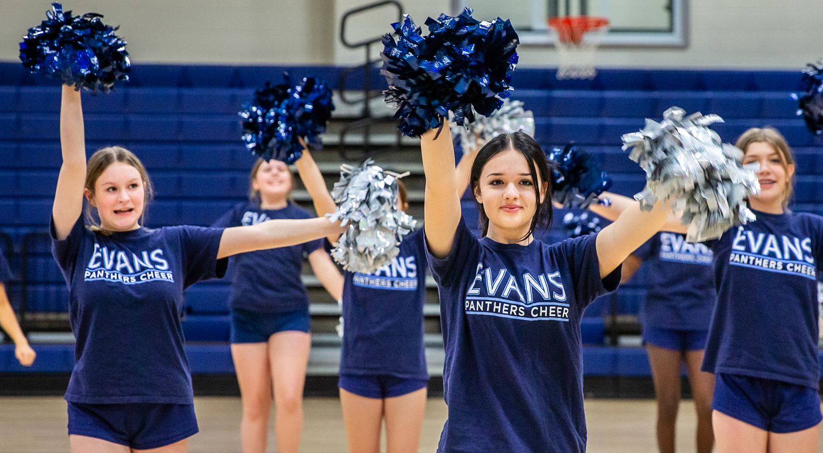 cheerleading students practicing in the gym