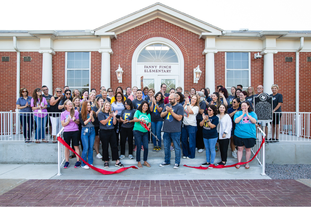 ribbon cutting ceremony at finch elementary