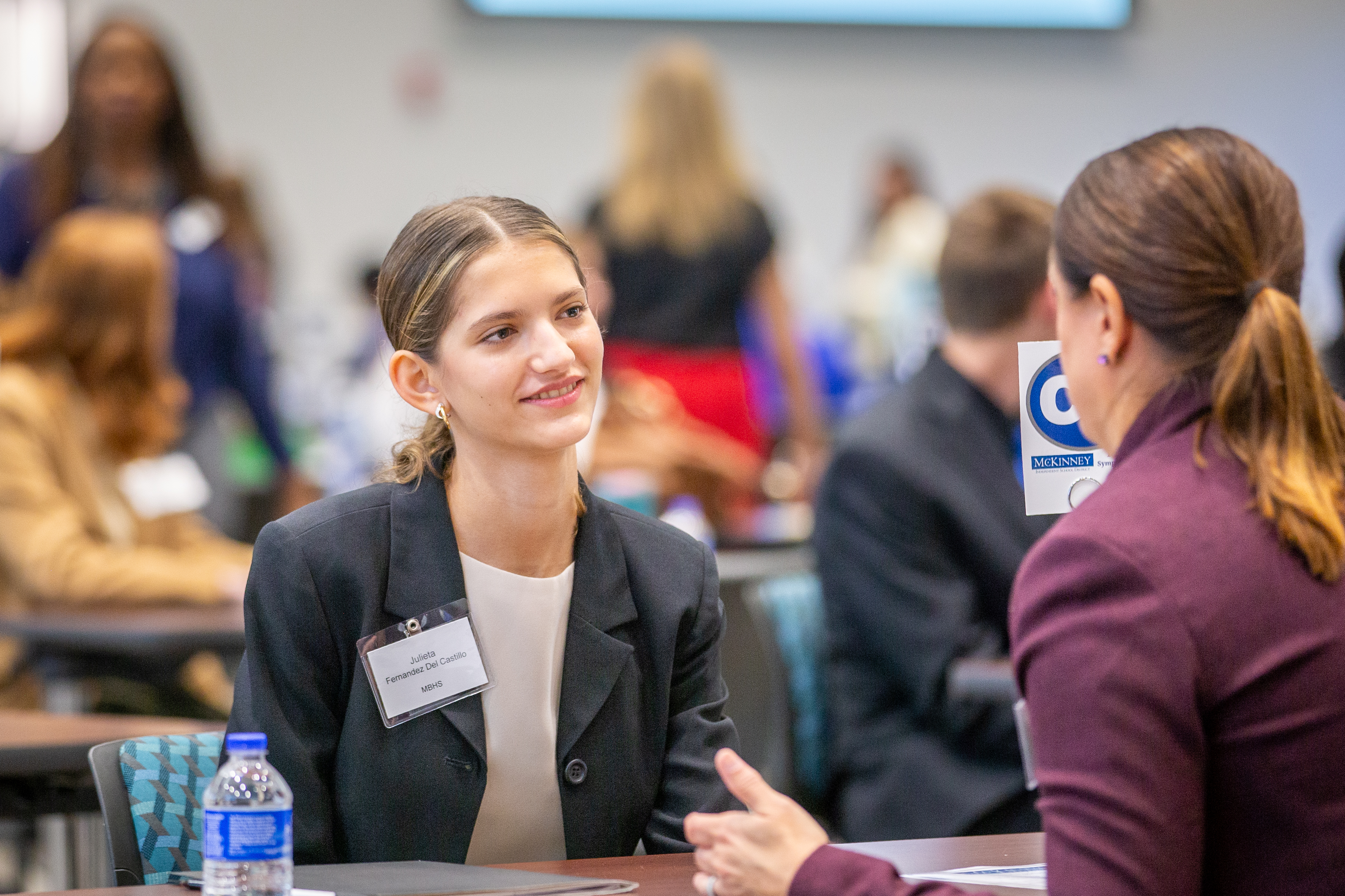 a student participates in an interview at the mckinney isd business symposium