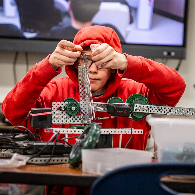 a student works on a project in an engineering class