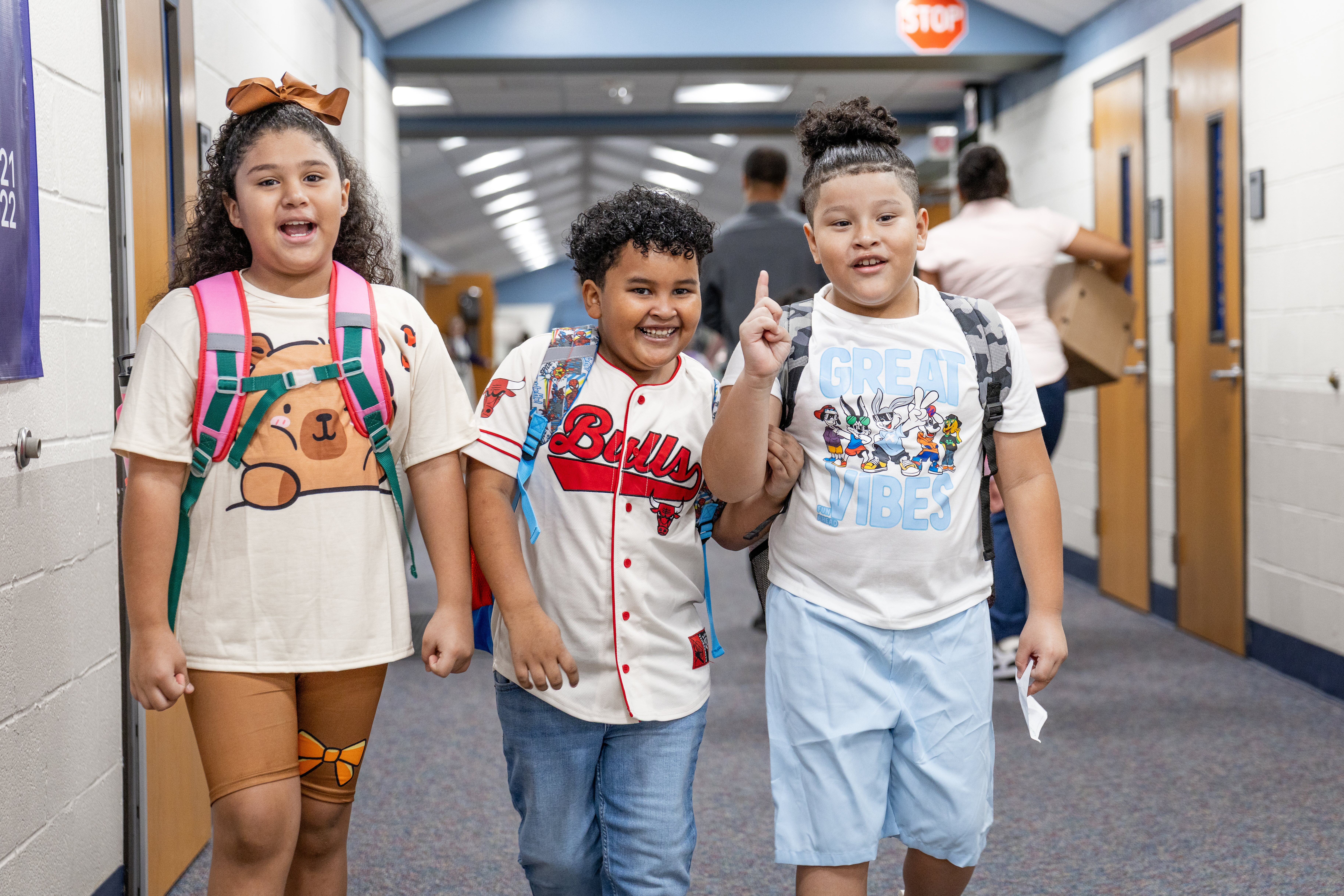 caldwell students walk down the hall on the first day of school