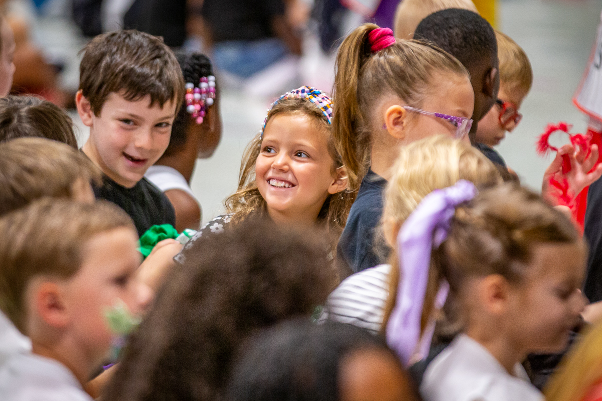 a student participates in a school assembly