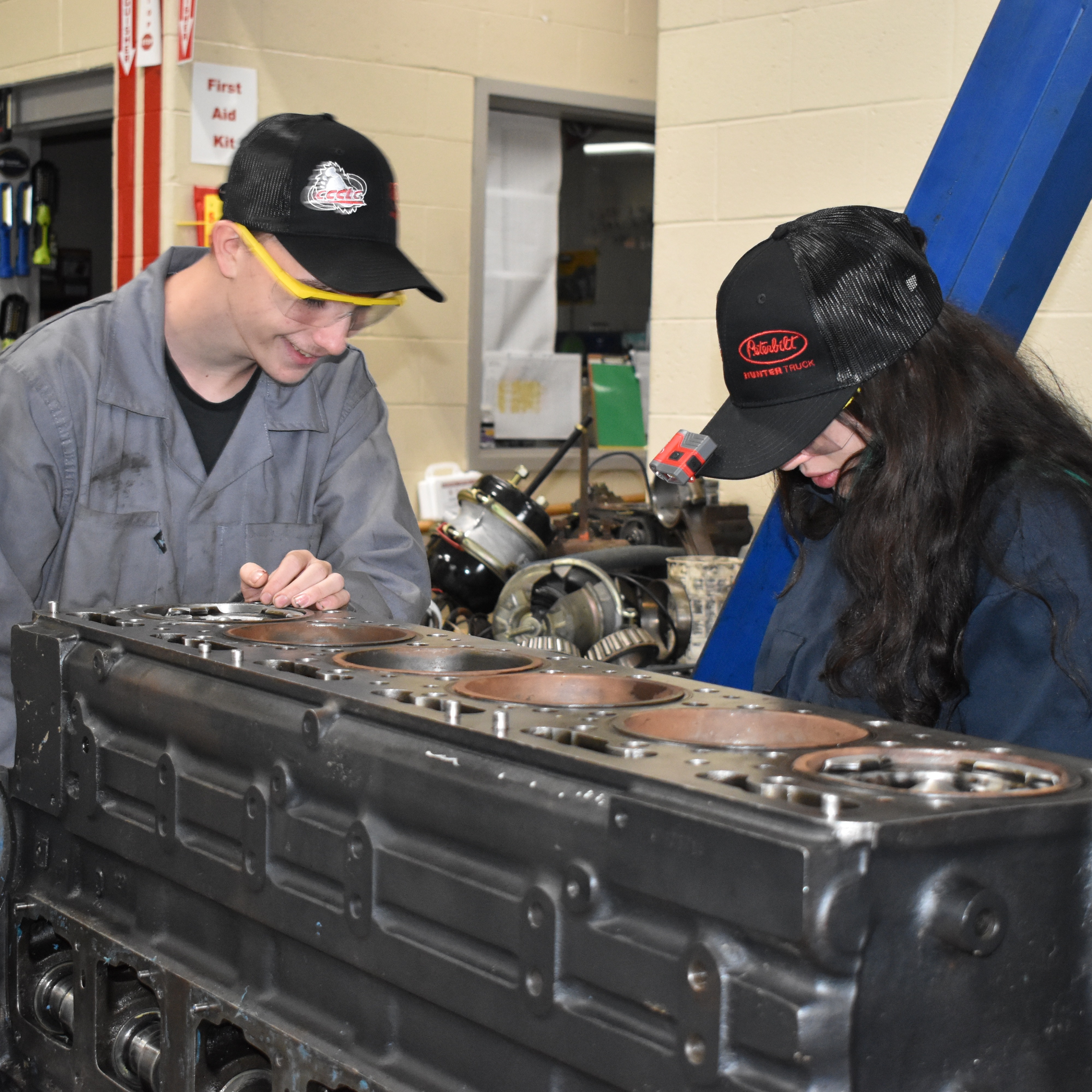 Student working on diesel engine