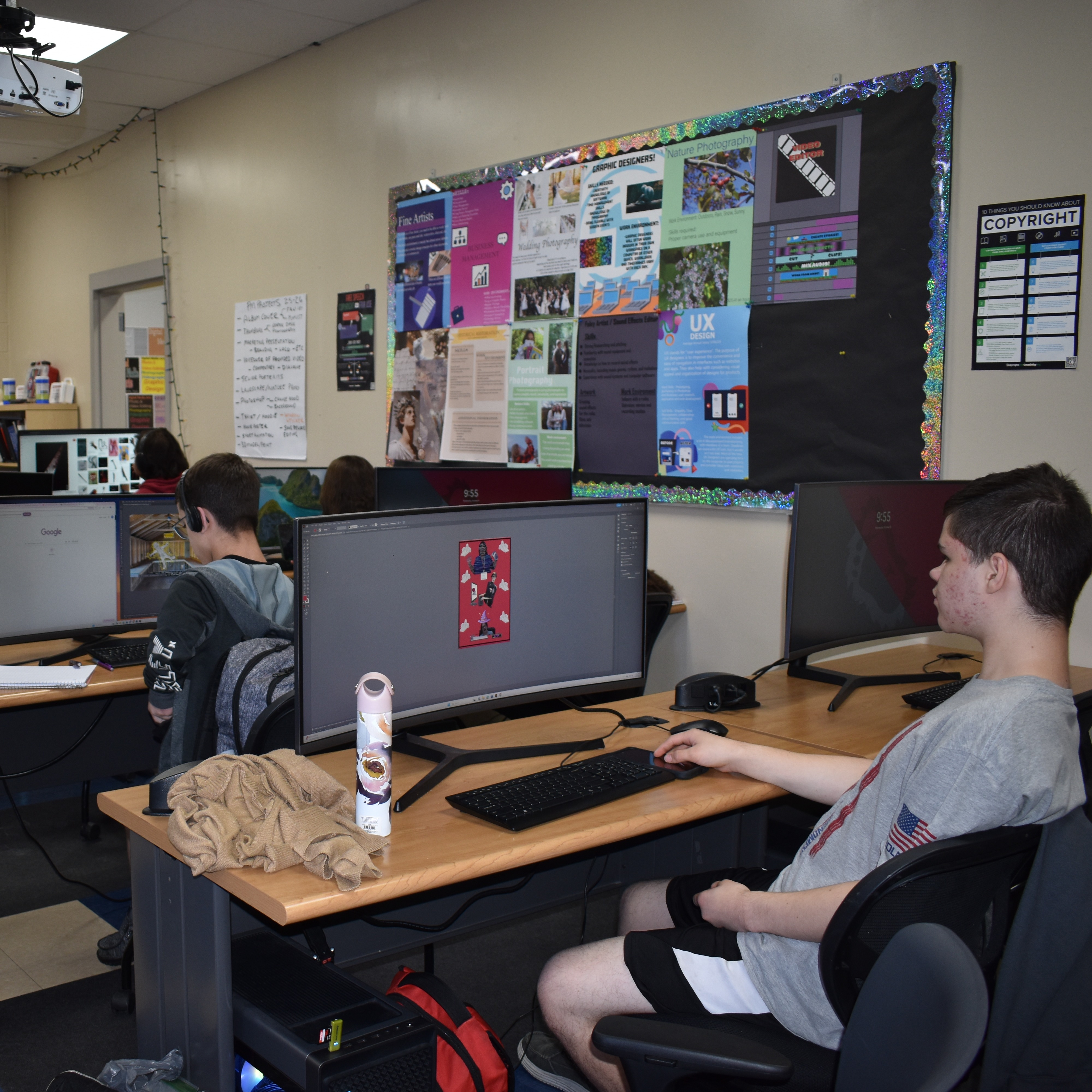 students setting up a camera set