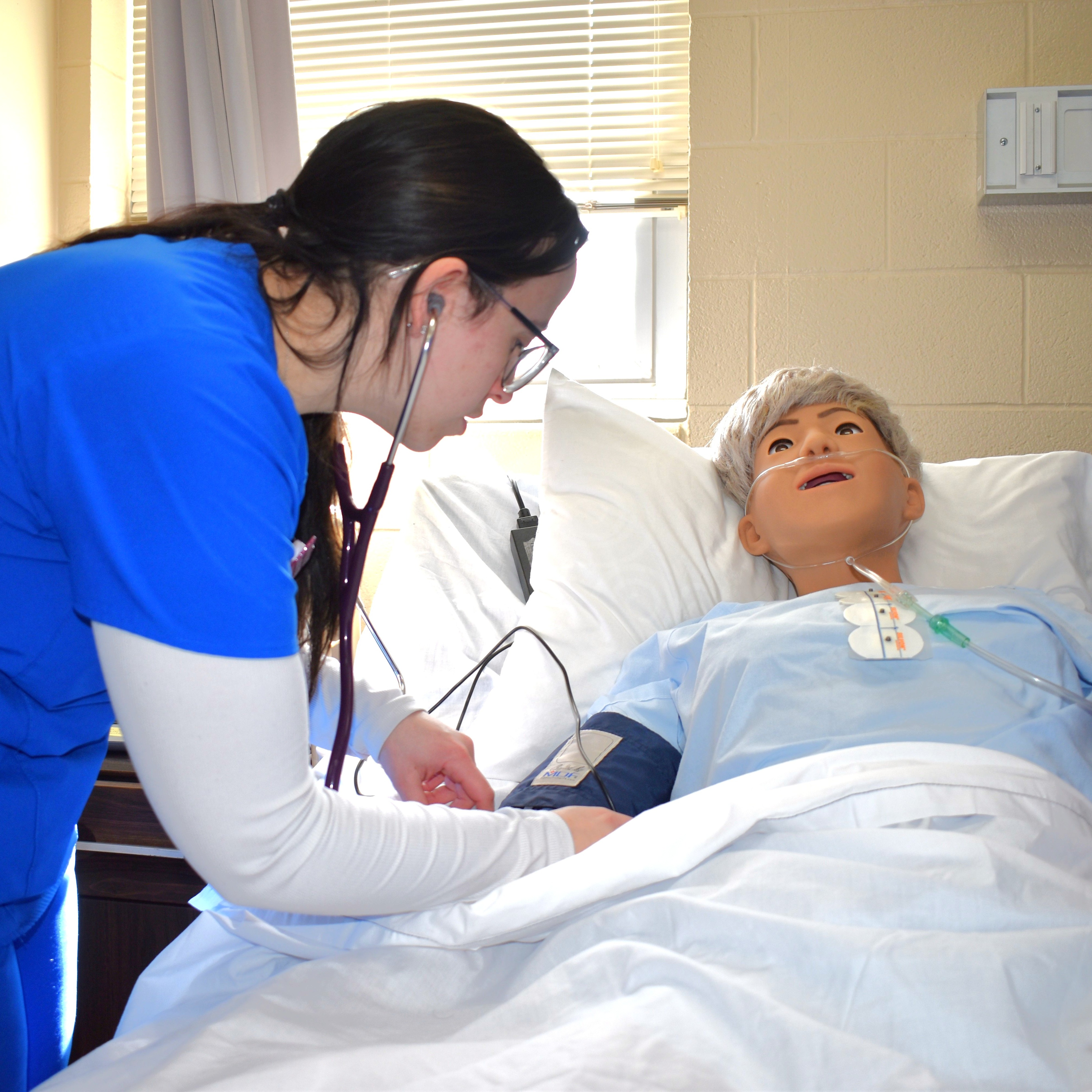 Nursing students with Mannequin