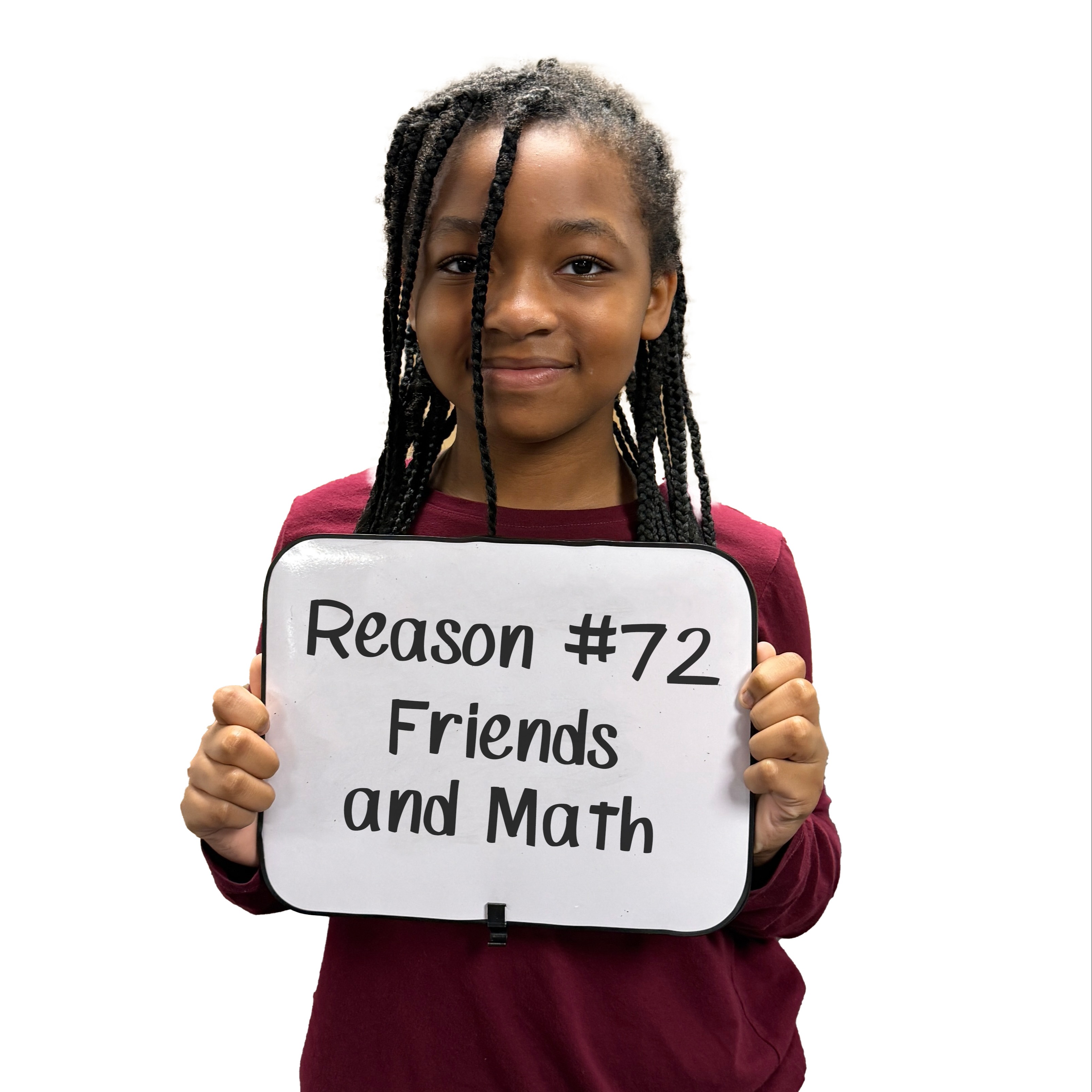 A female student holding a sign that says, Reason #72 Friend and Math, as her reason why she loves school.