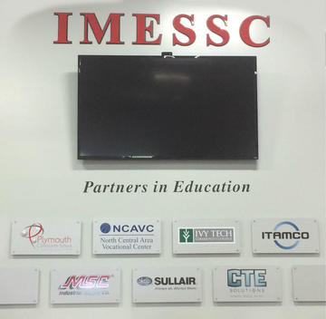 photo of wall with partners in education logo hanging