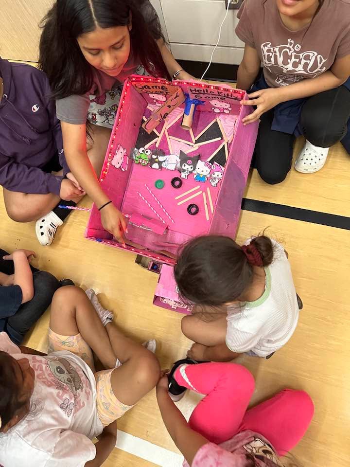 first graders building an arcade game