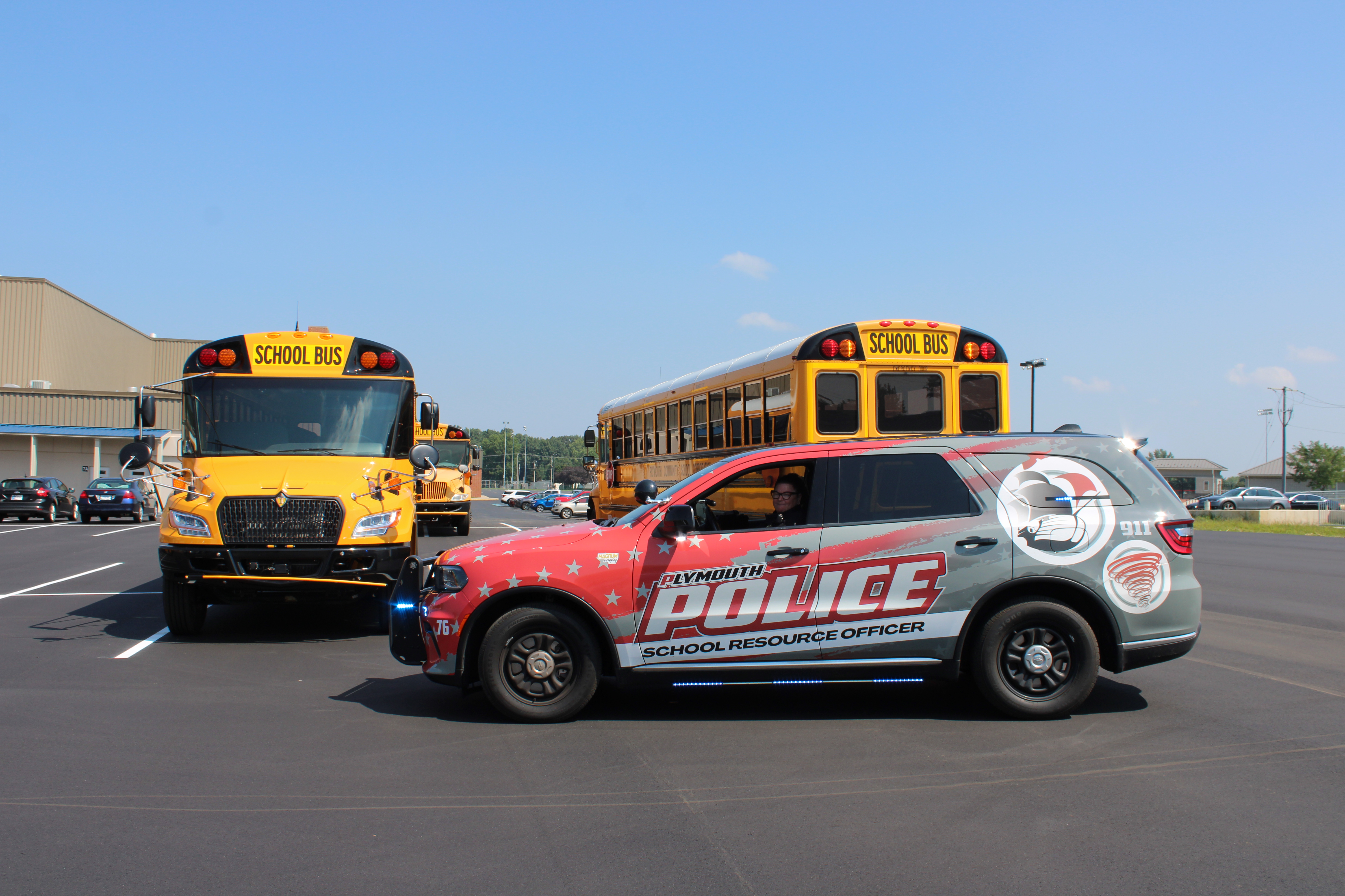 Bridget Hite with School Year buses