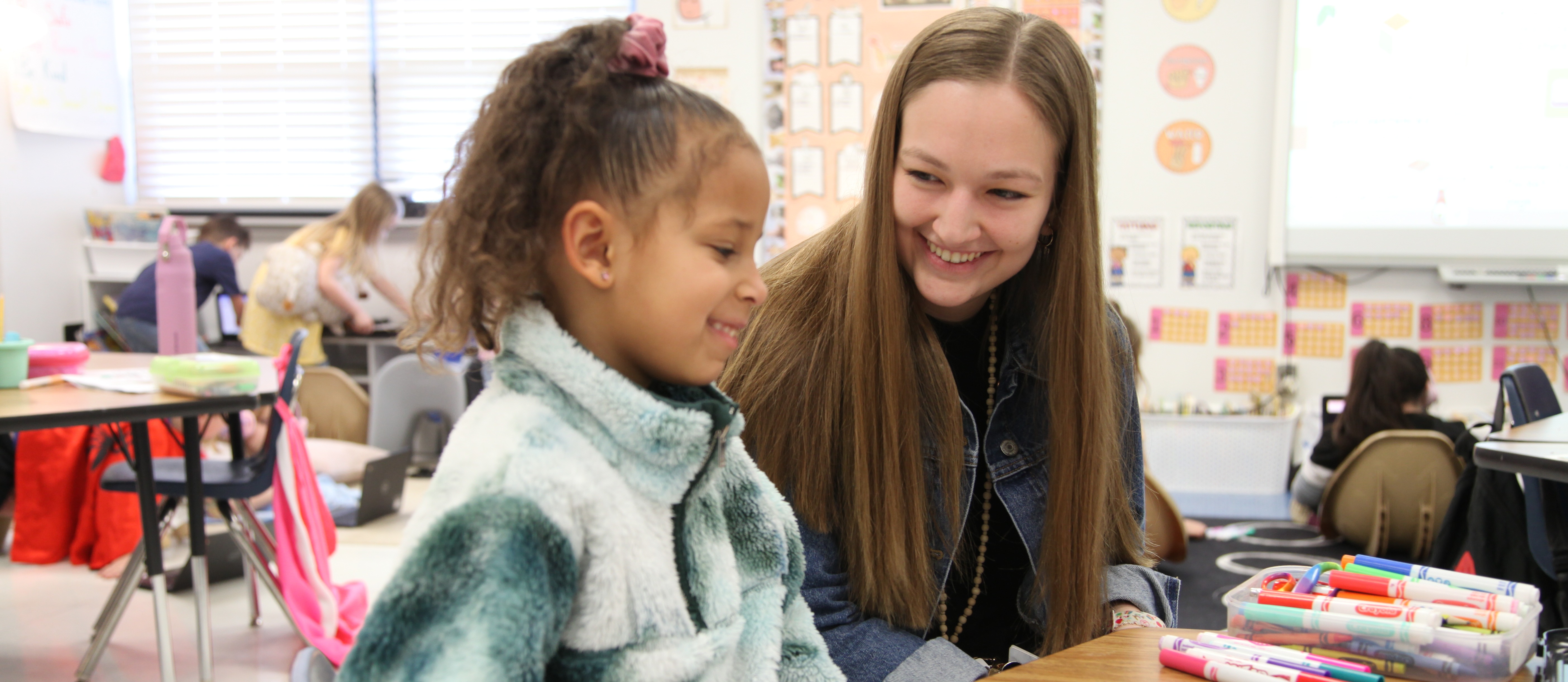 Student and teacher working together