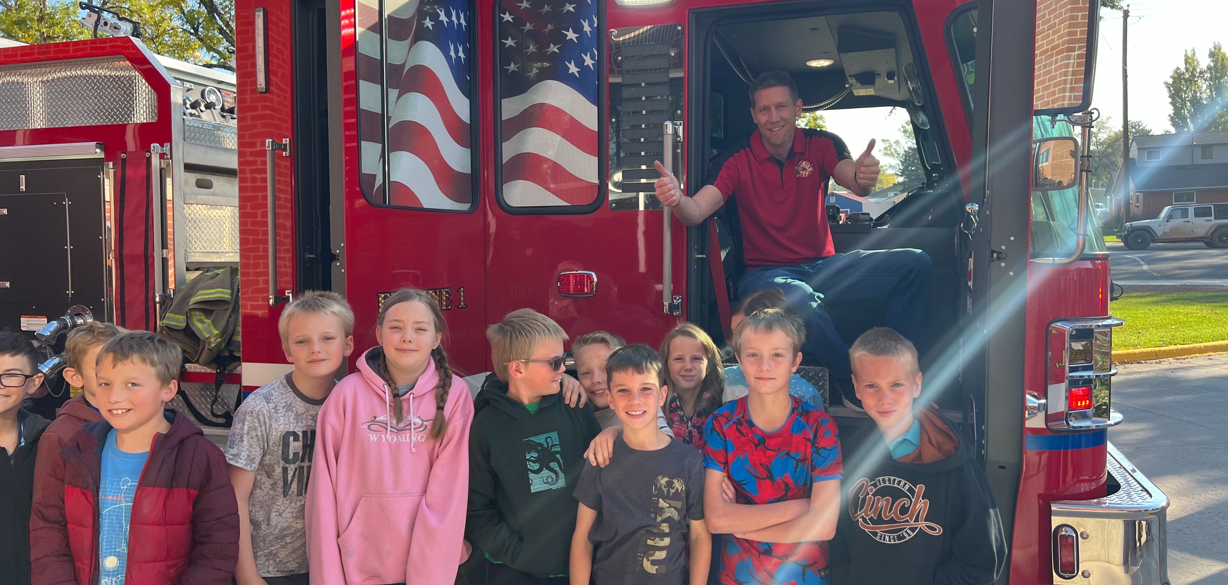 Students learning about a Fire truck